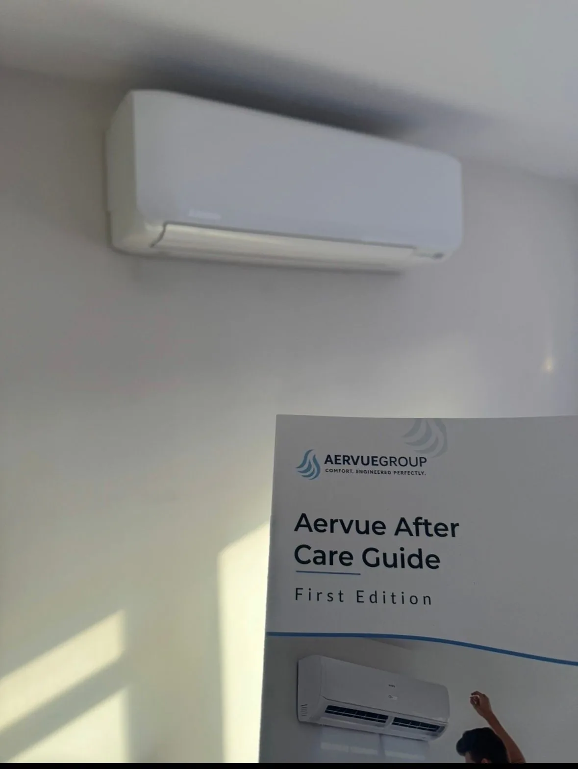 Indoor air conditioning unit fitted with the Aervue aftercare guide
